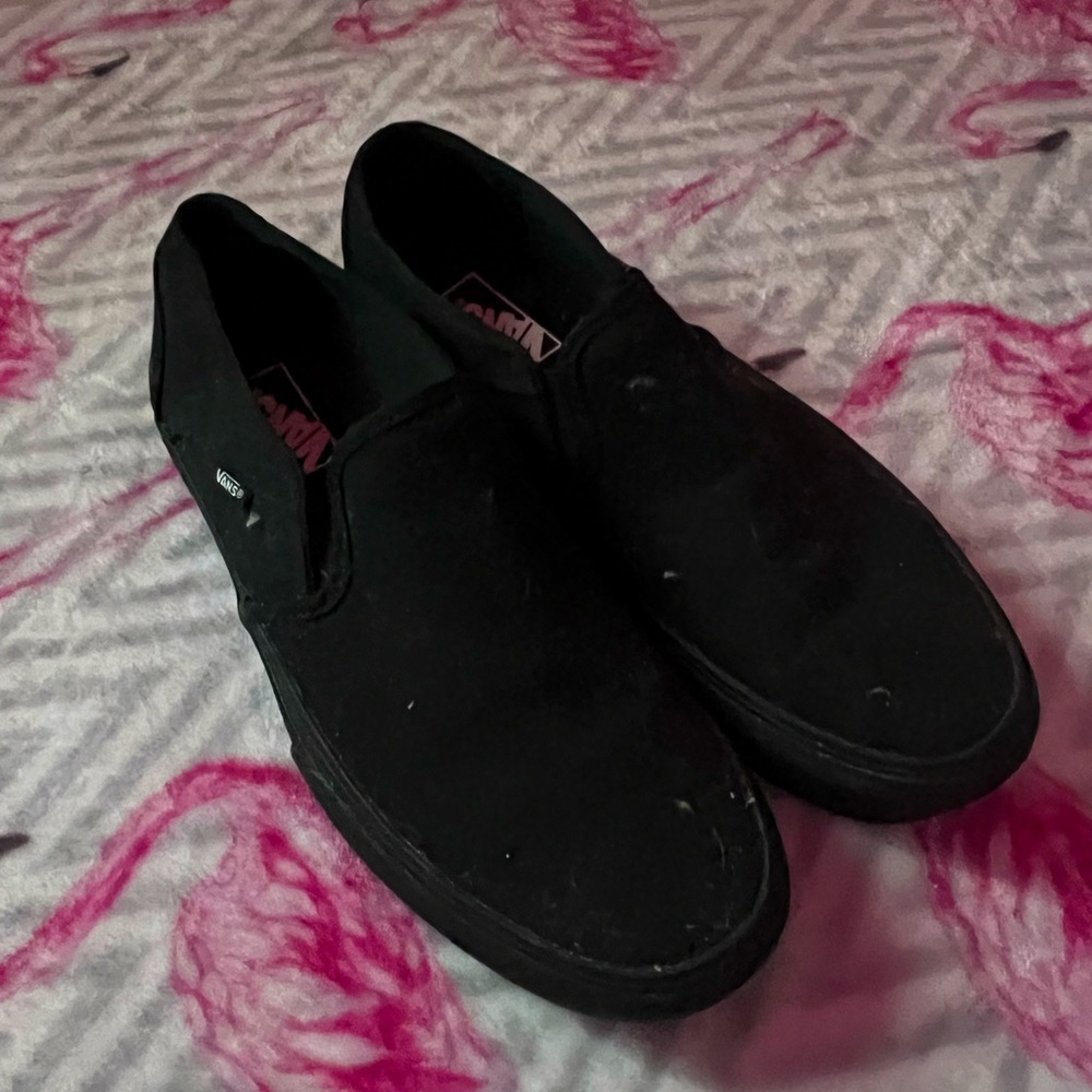 Size 9.5 black slip on Vans